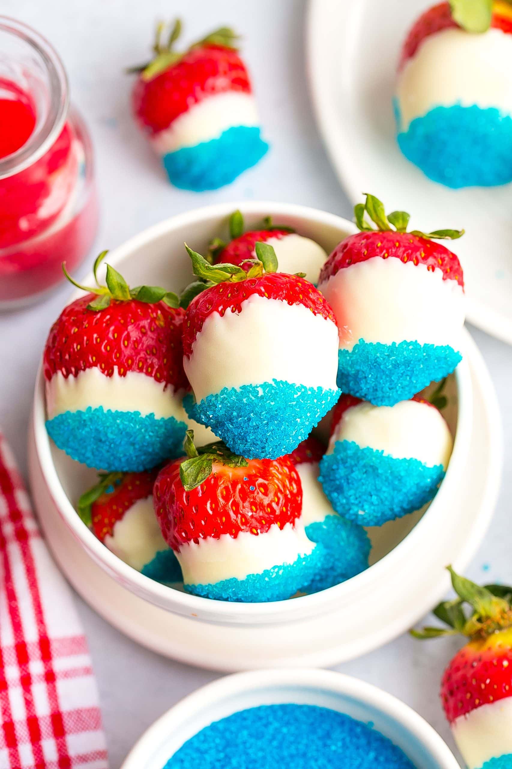 Red, White, and Blue Strawberries in a bowl.