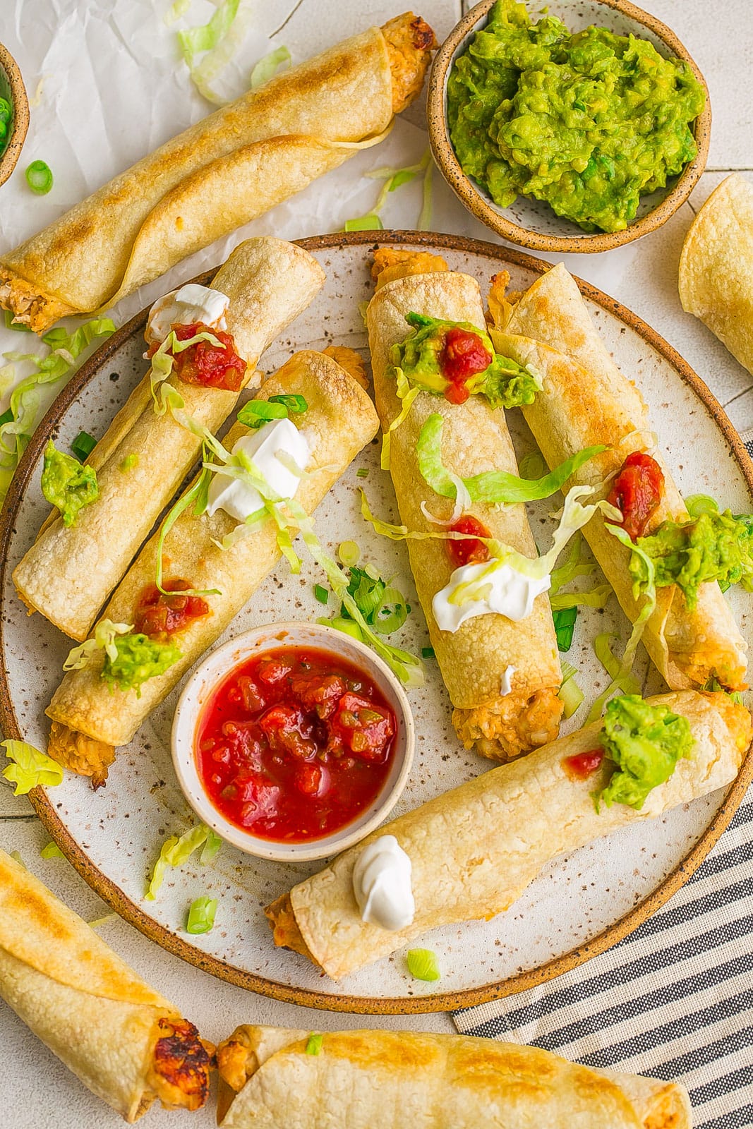 Baked Chicken and Cheese Taquitos on plate.