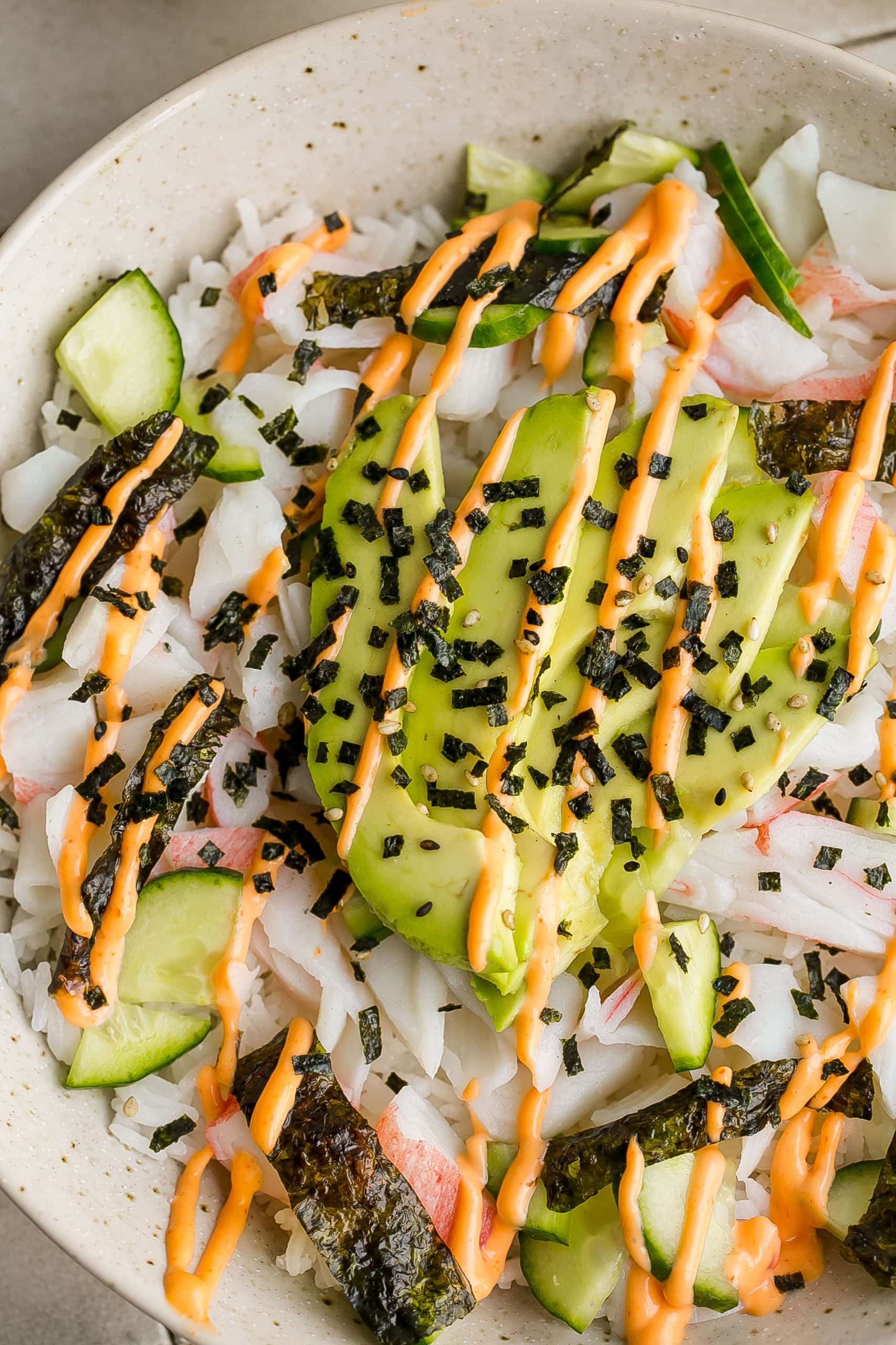 Close up of deconstructed sushi roll in a bowl. 