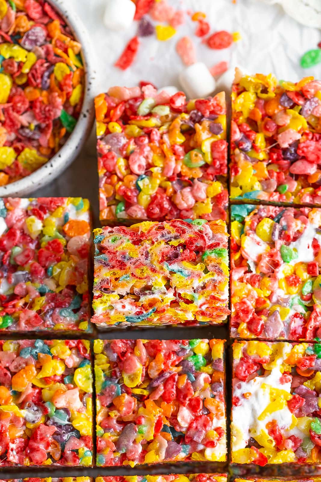 Fruity rice krispies cut into squares.