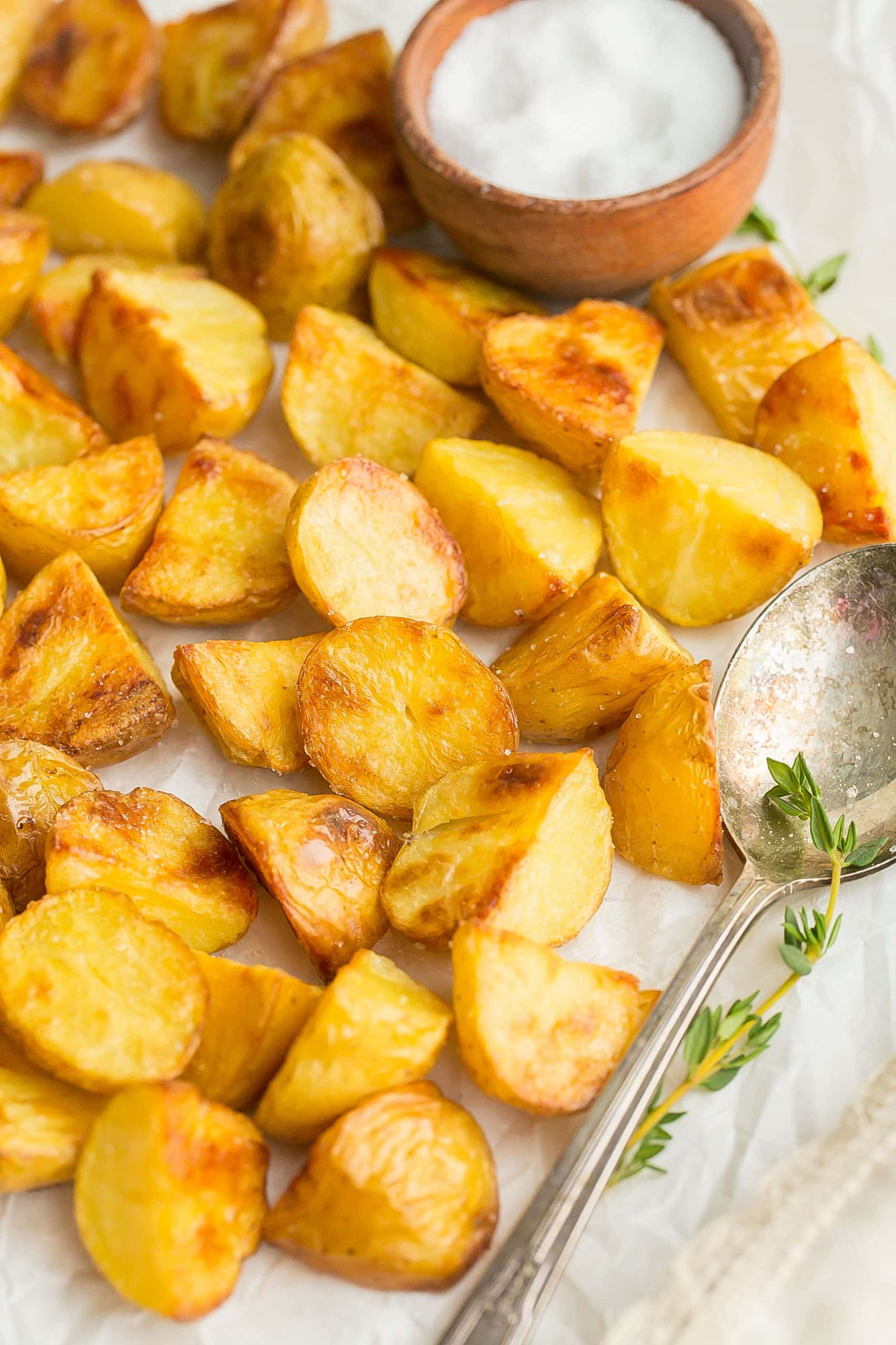 Potatoes with a serving spoon.