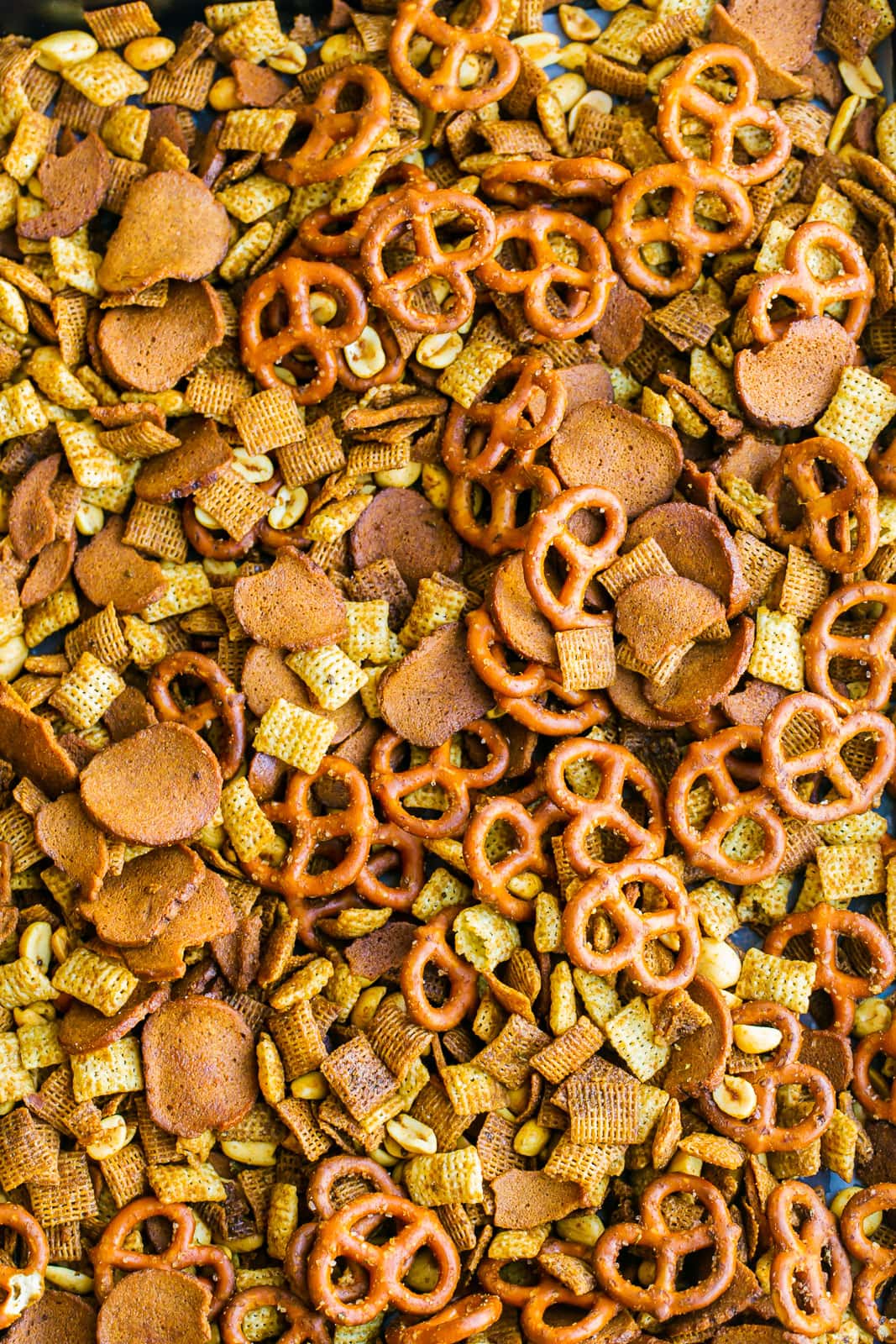 Chex mix on baking sheet.