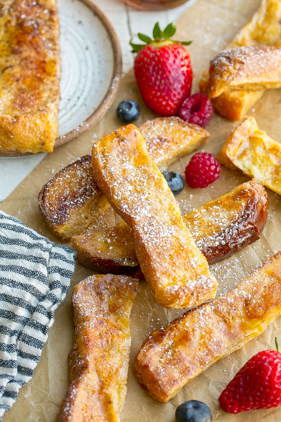 French Toast Sticks on parchment paper.