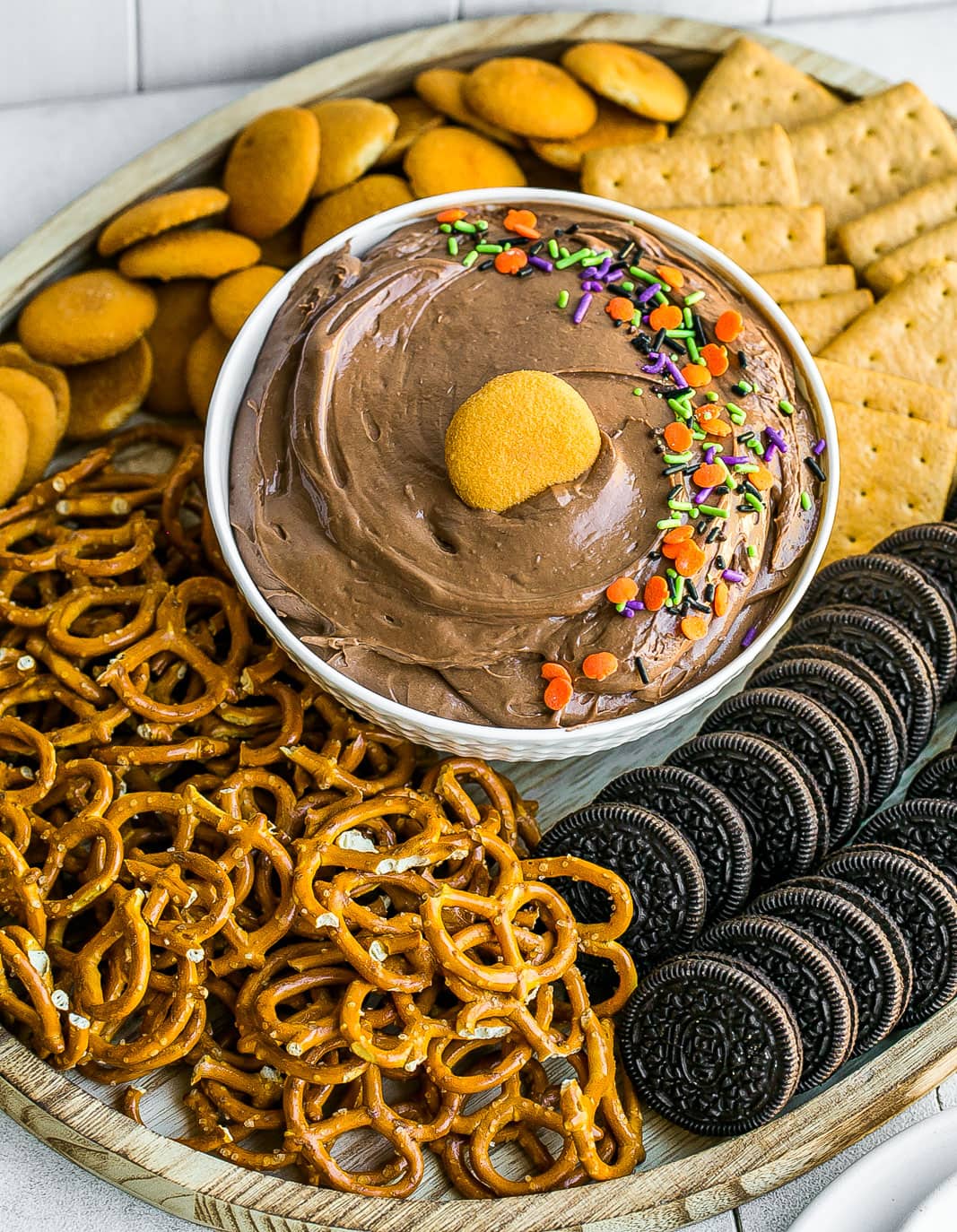 Brownie dip in a serving bowl with dippers.