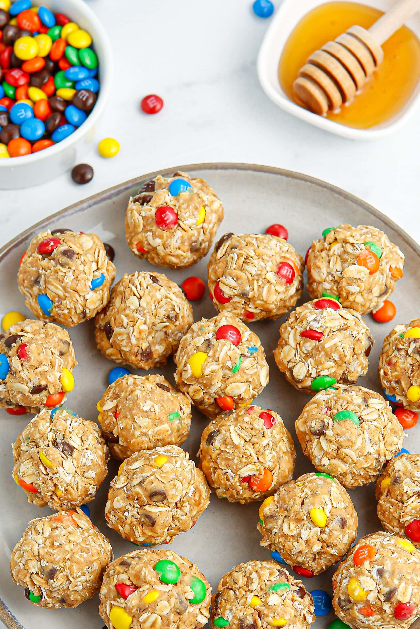 M&M energy balls on a plate.
