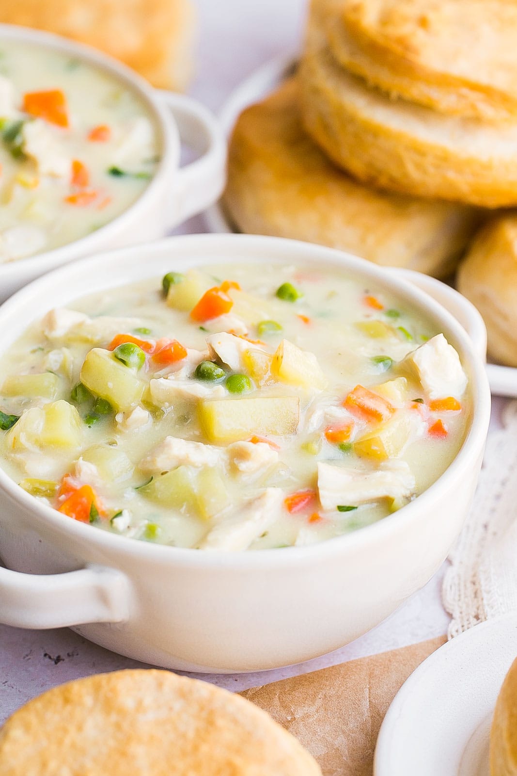Creamy soup with a side of biscuits.