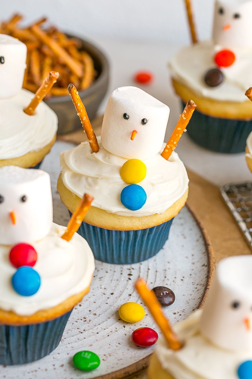 Snowman Cupcakes on a plate.