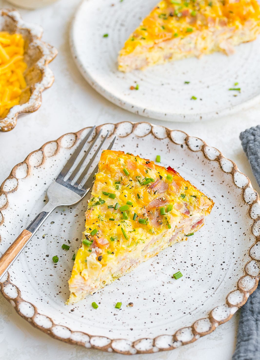 Ham and cheese frittata on plate.