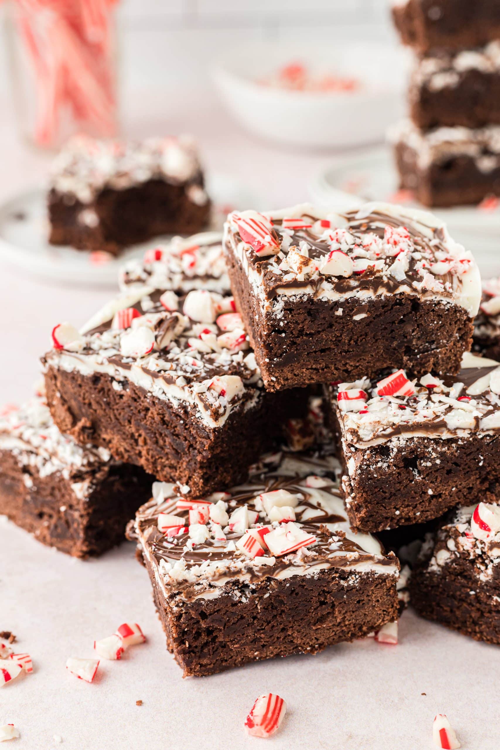 Brownies on a plate with chocolate peppermint on top.
