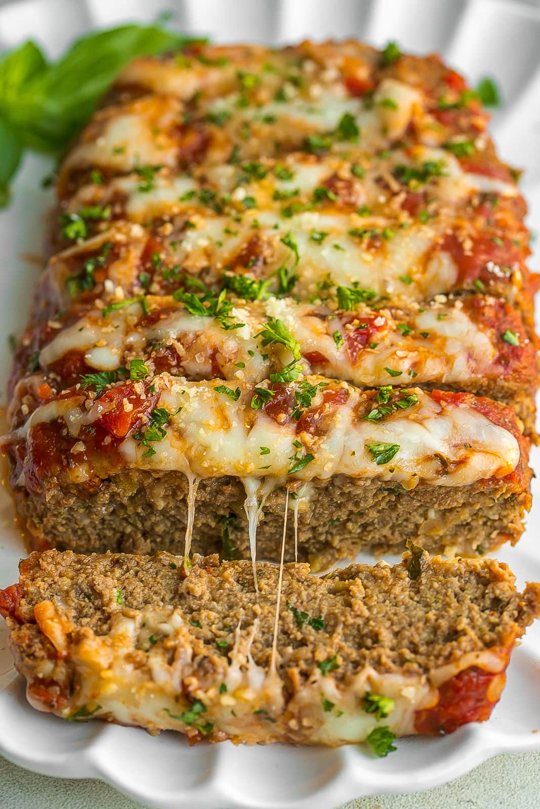 Cheesy meatloaf closeup view.