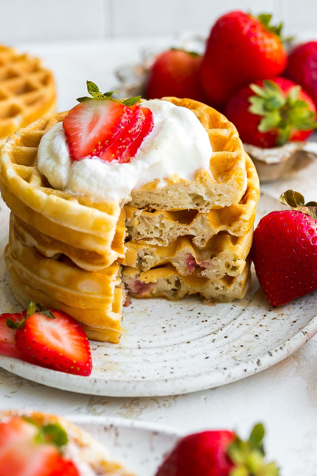 Stack of strawberry waffles.