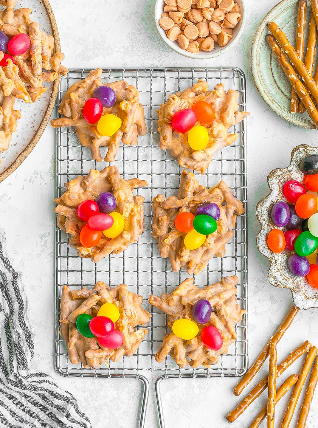 Cookies on cooling rack with jelly beans.