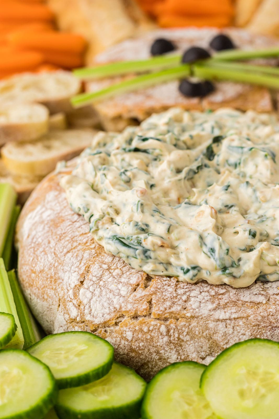 Spinach dip in bread bowl.