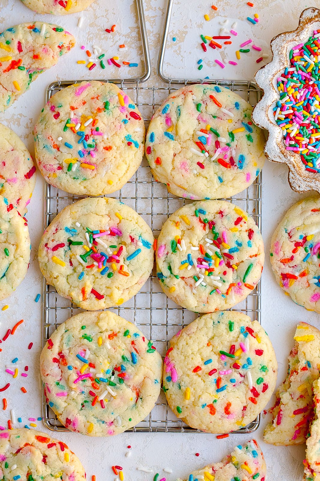 Funfetti cake mix cookies on a wire rack.