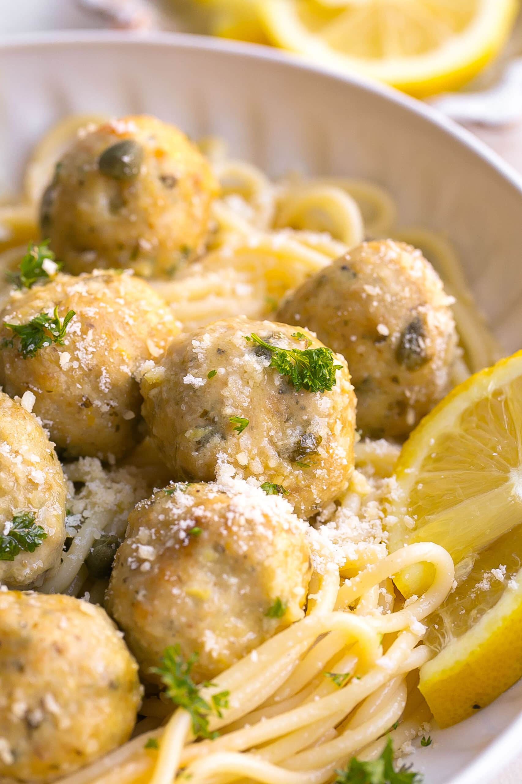 Meatballs and pasta in a bowl.