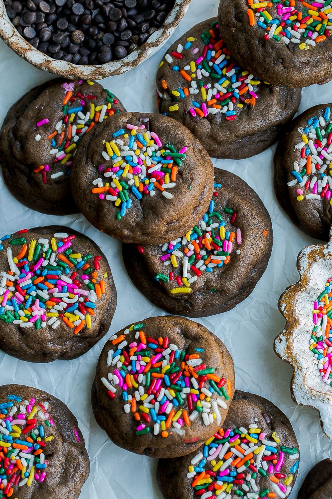 Chocolate cookies with sprinkles on top.