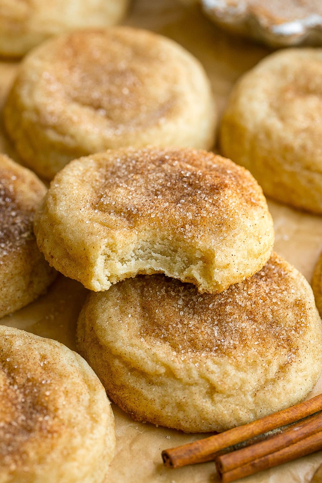 Snickerdoodle with bite mark in center.