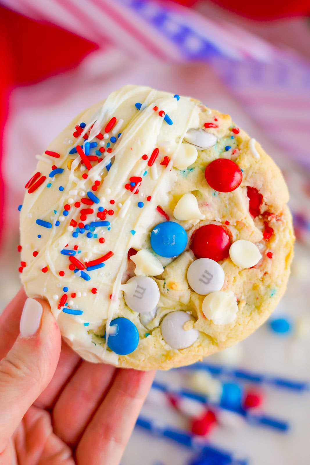 Hand holding Cake Mix M&M cookie.