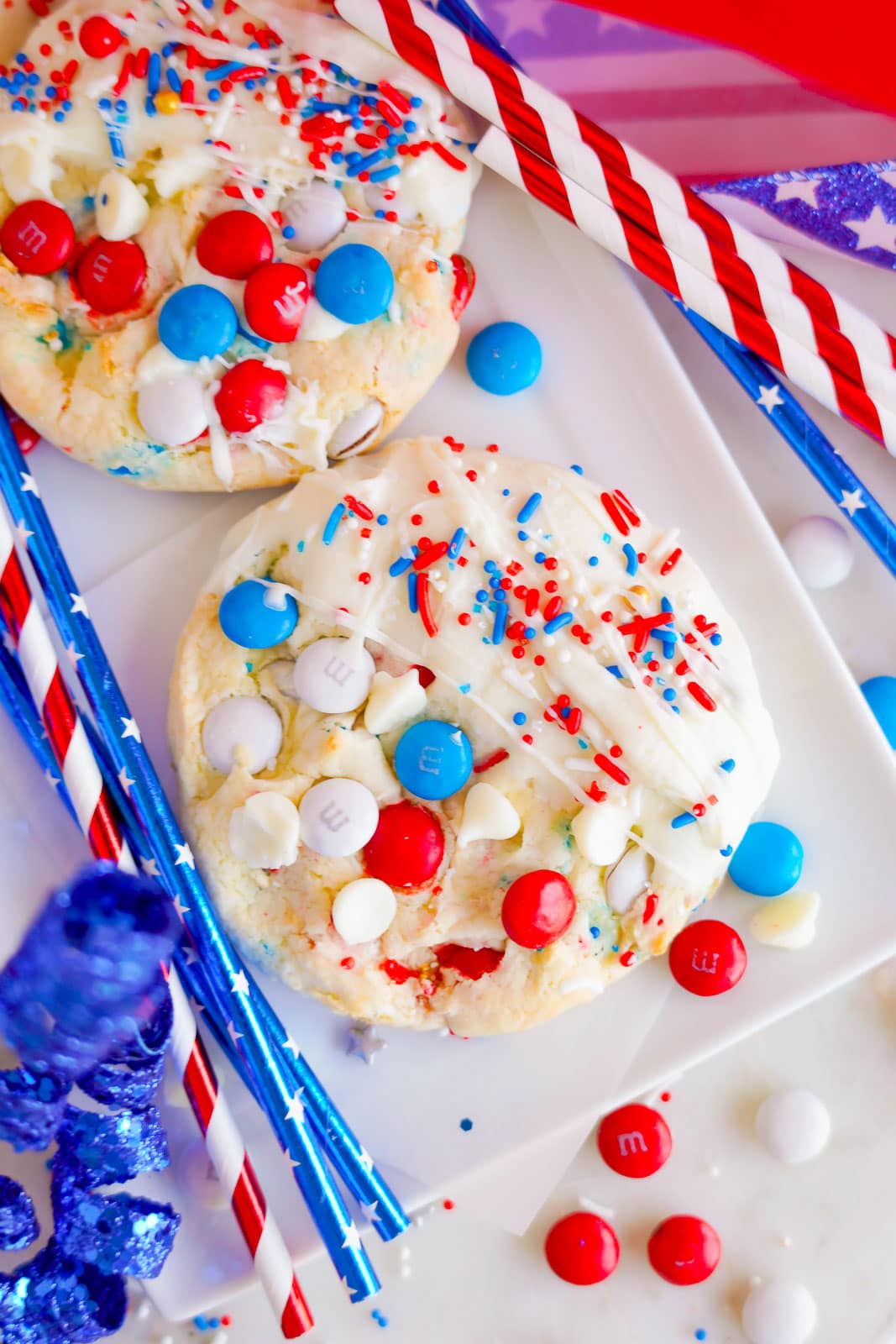 Patriotic cookies on a plate with festive M&Ms.