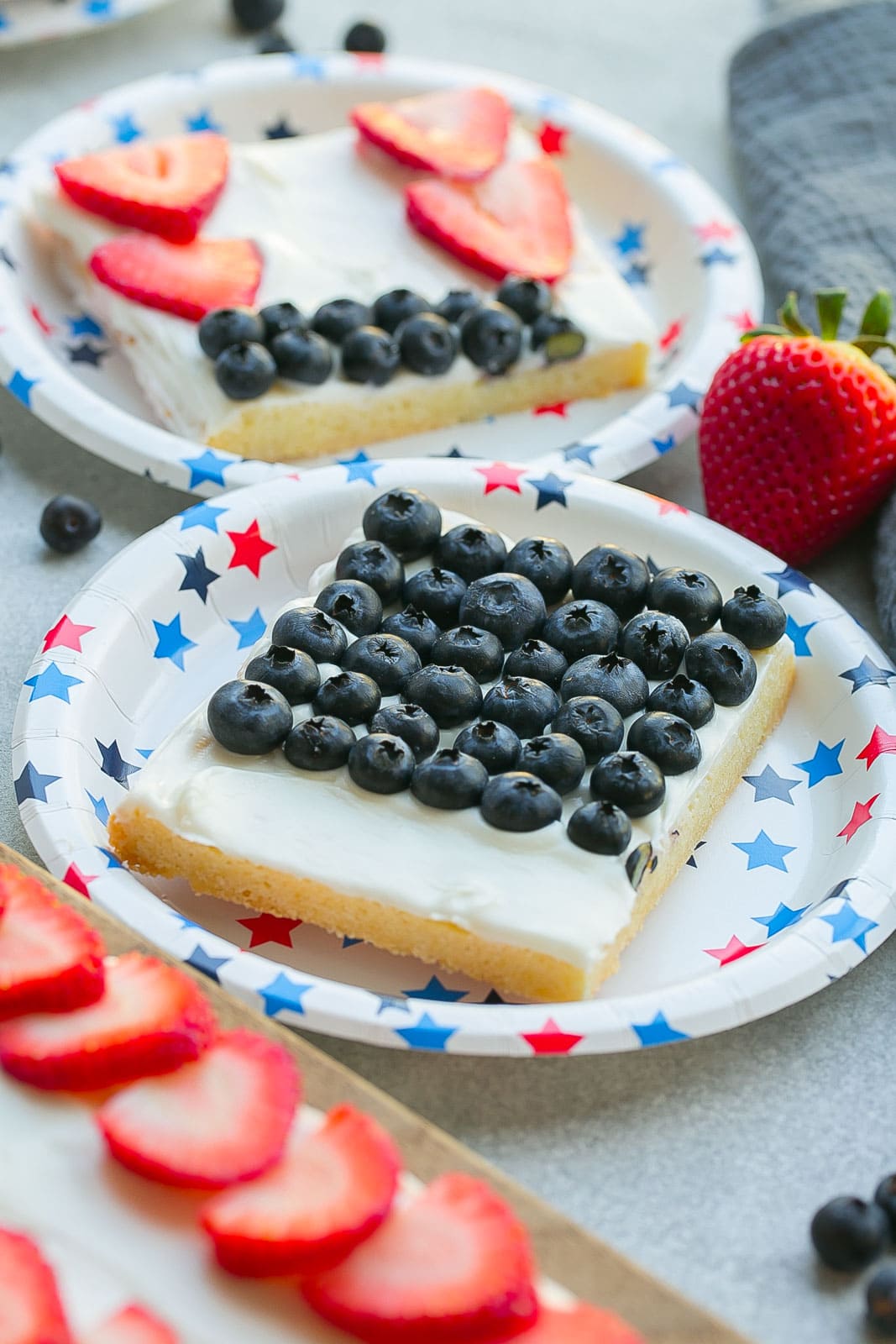 American Flag Fruit Pizza slice on a plate.
