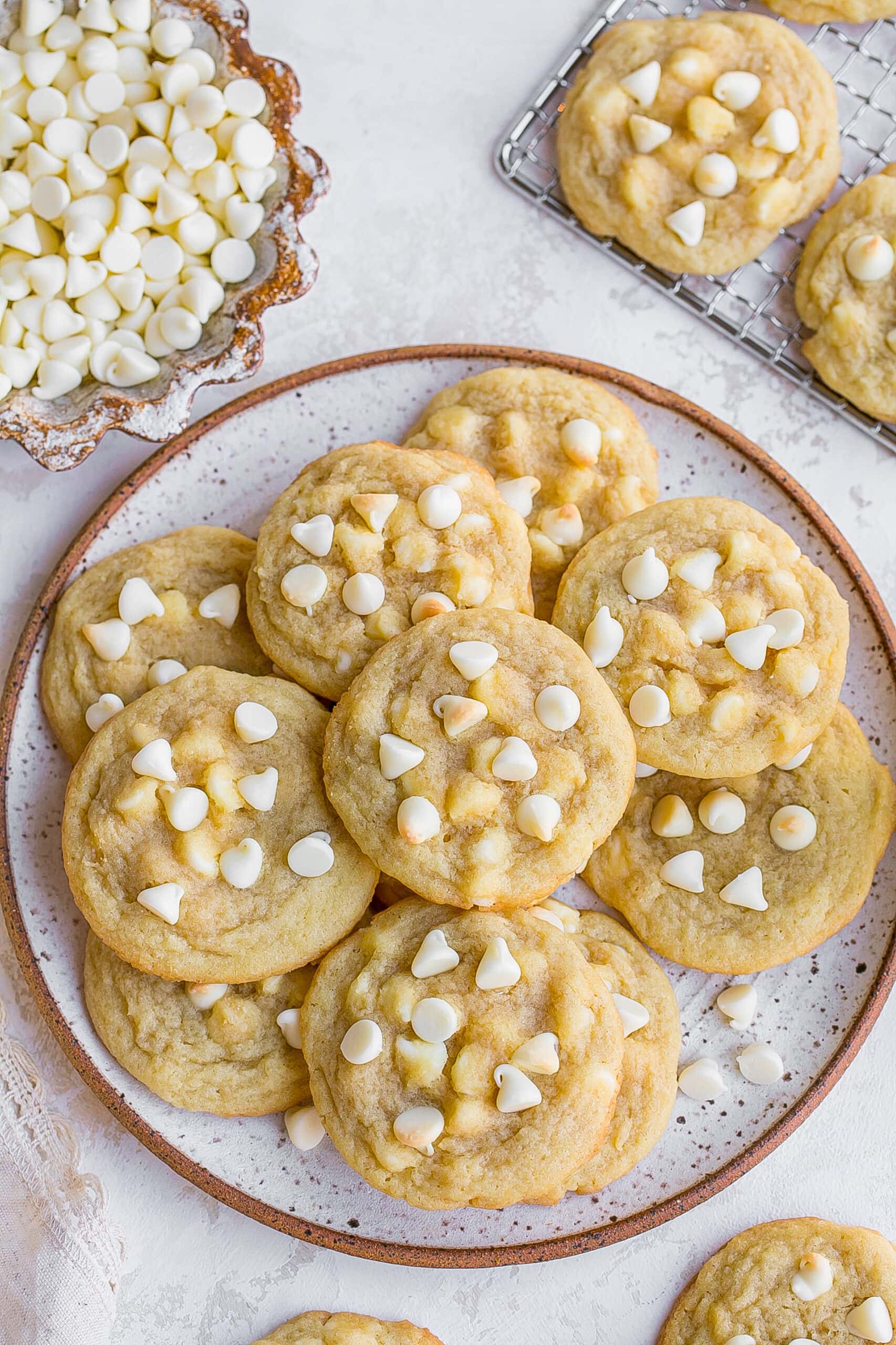 White chocolate cookies on a plate.