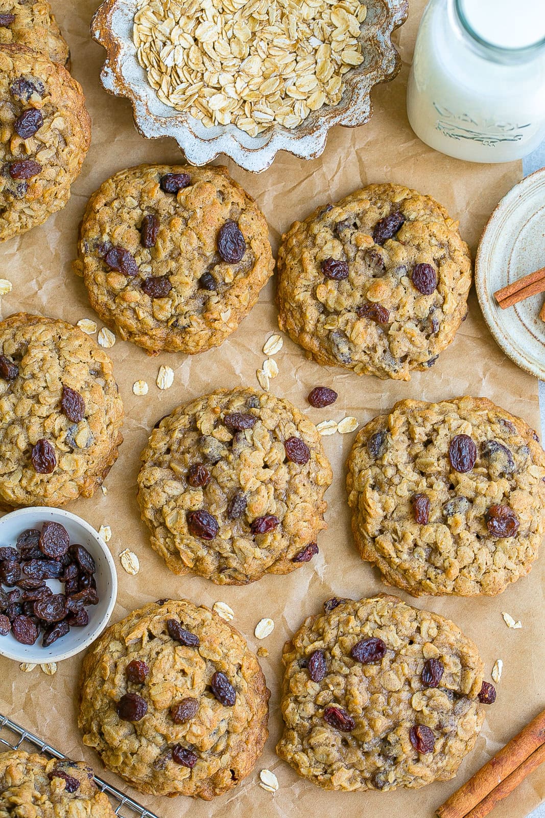 Bakery Style Oatmeal Raisin Cookies on parchment paper.