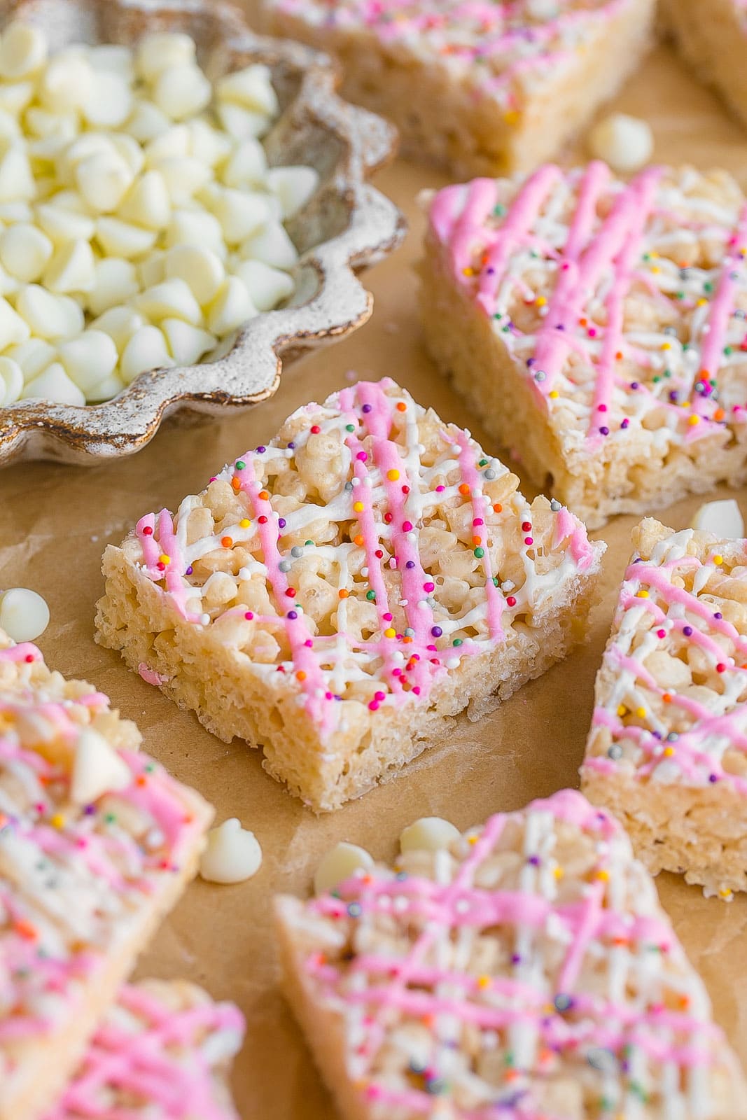 Rice krispie treats with white chocolate chips.