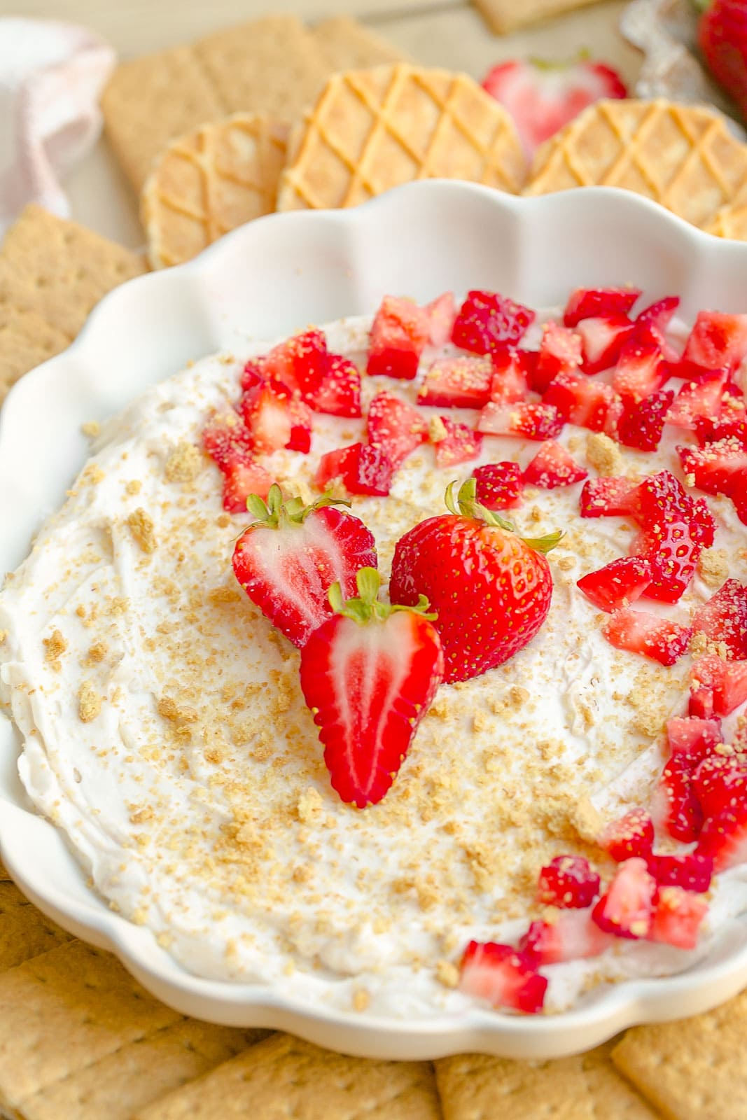 Strawberry Cheesecake Dip with strawberries on top.