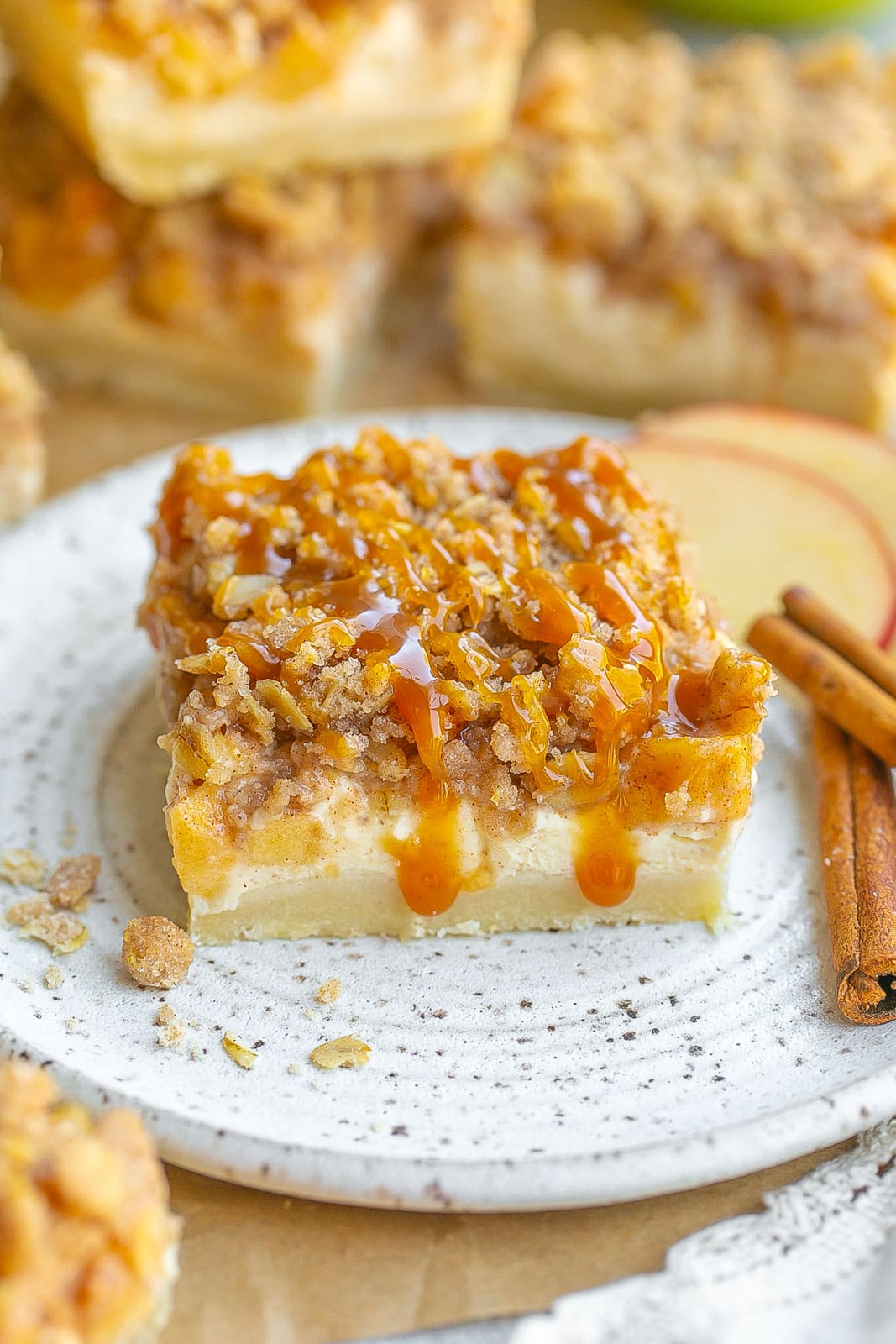 Caramel Apple Cheesecake Bars on a plate.