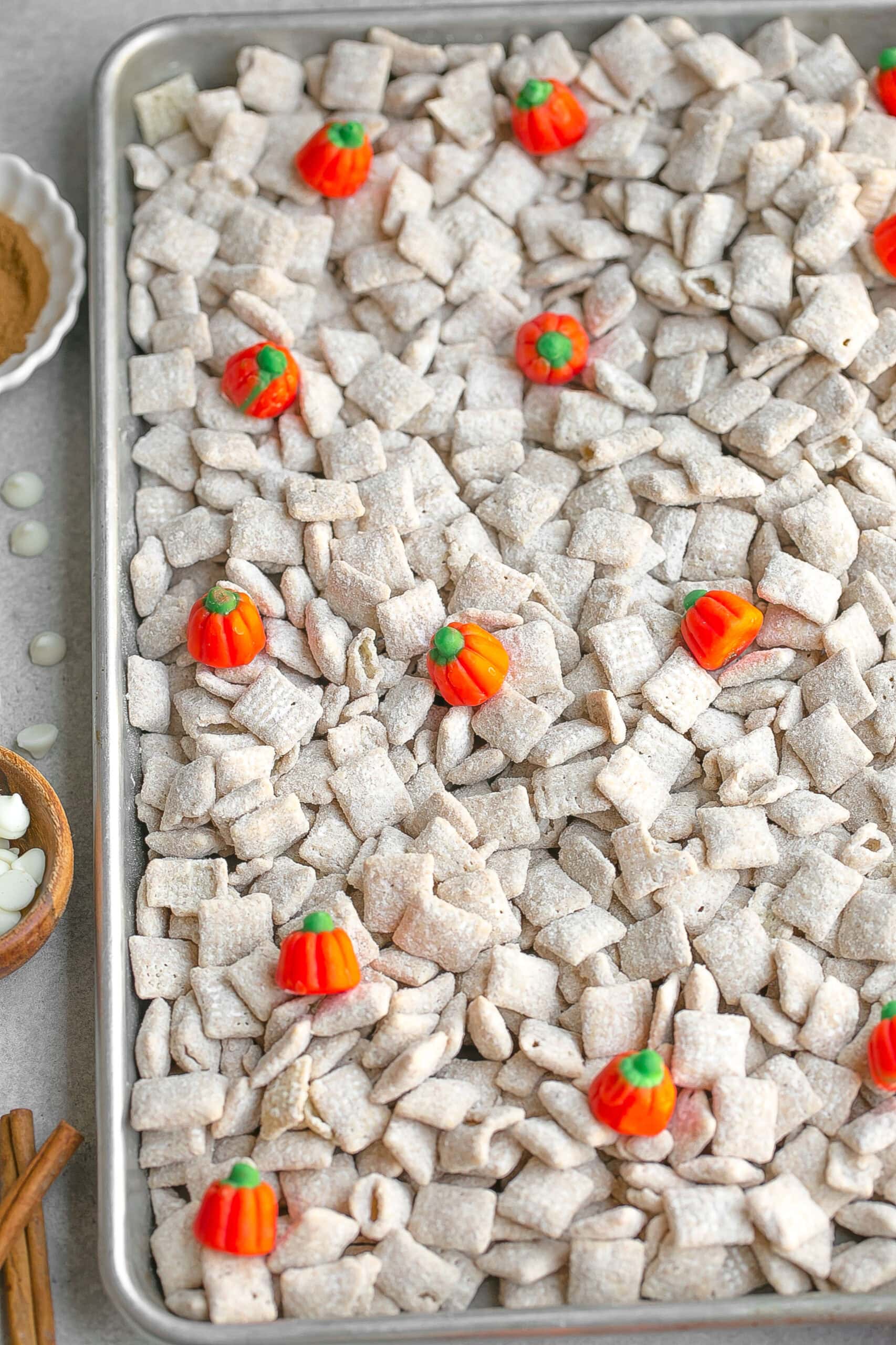 Baking sheet with Pumpkin Spice Puppy Chow.