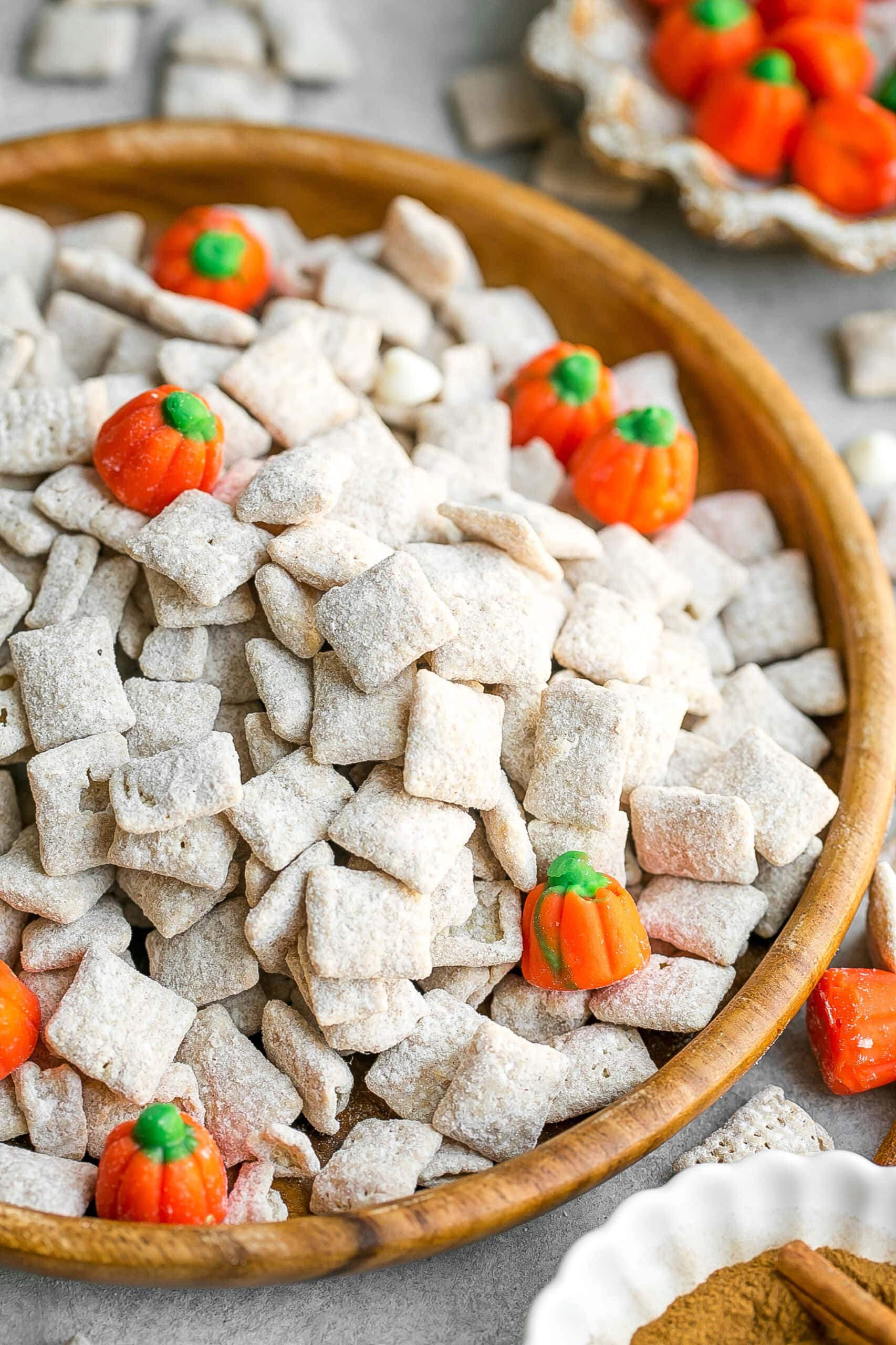 Close up of muddy buddies with pumpkin candies. 