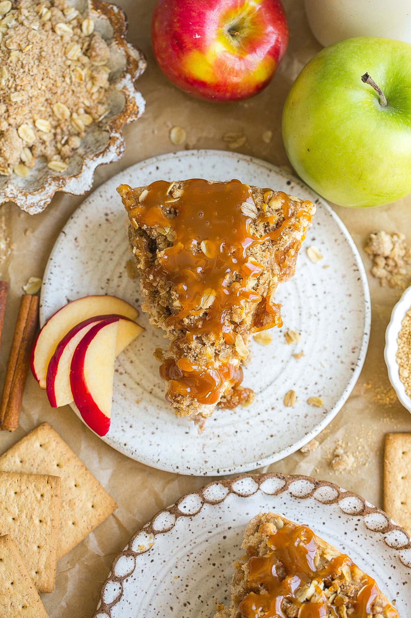 Birds eye view of caramel apple pie cheesecake slice.