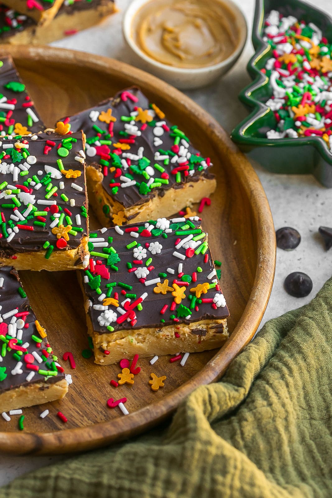 Plate full of festive no bake peanut butter chocolate bars.