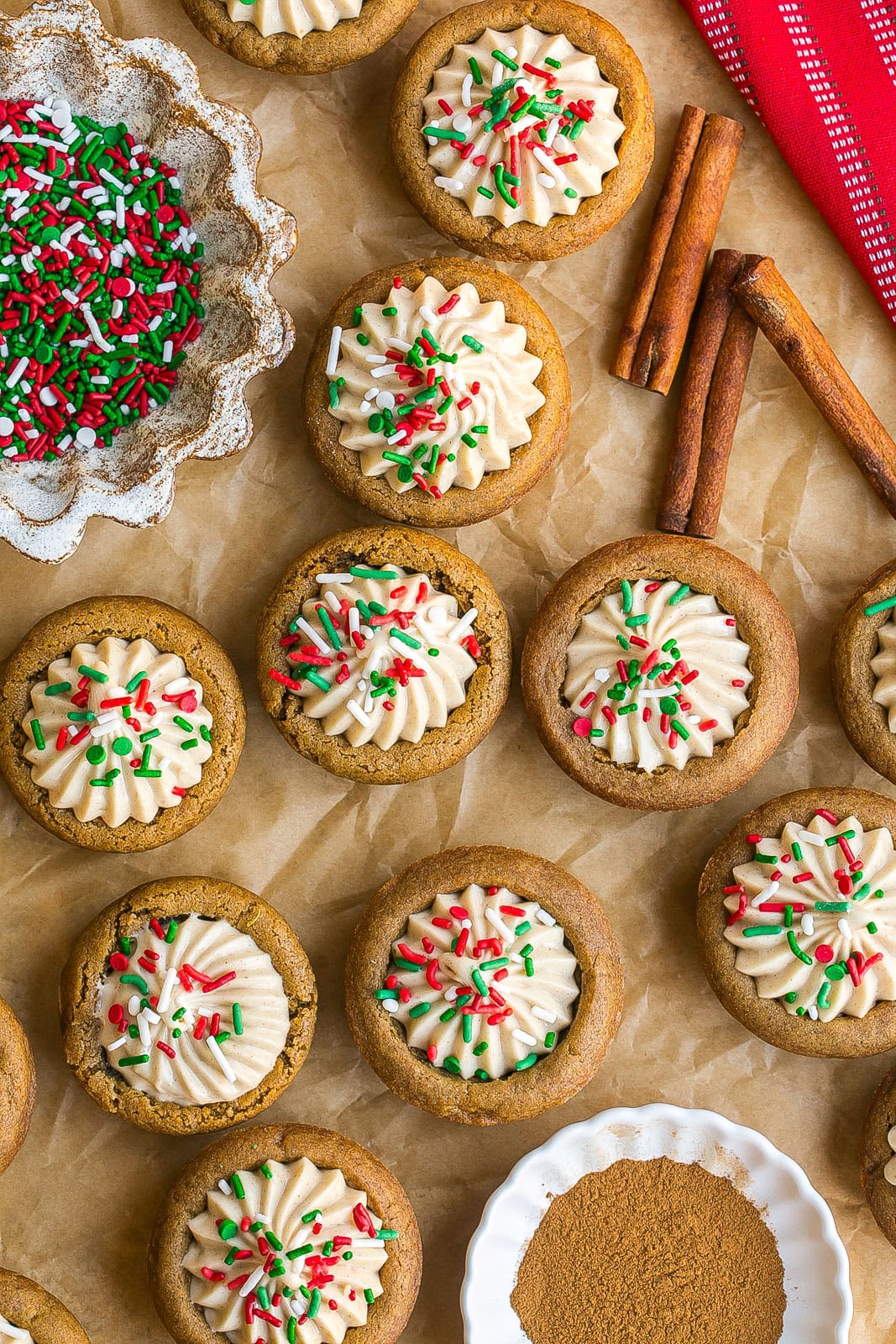 Beautiful display of gingerbread cookie cups with frosting and sprinkles.