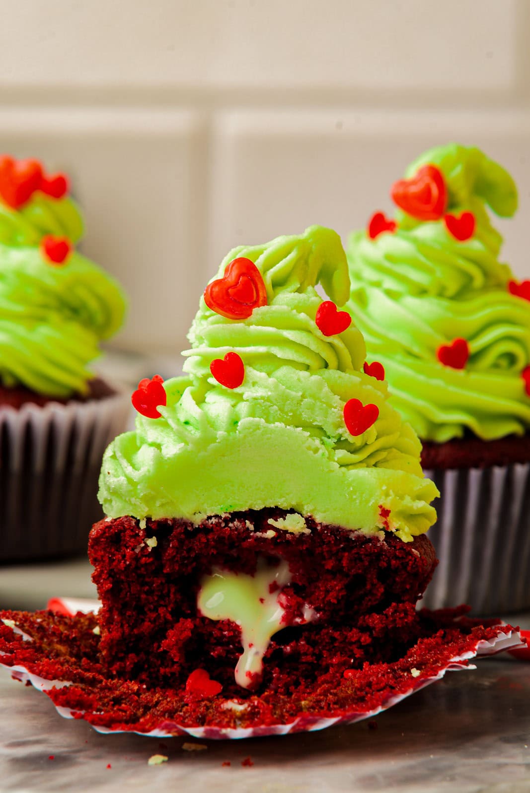 Pudding filled grinch cupcakes.