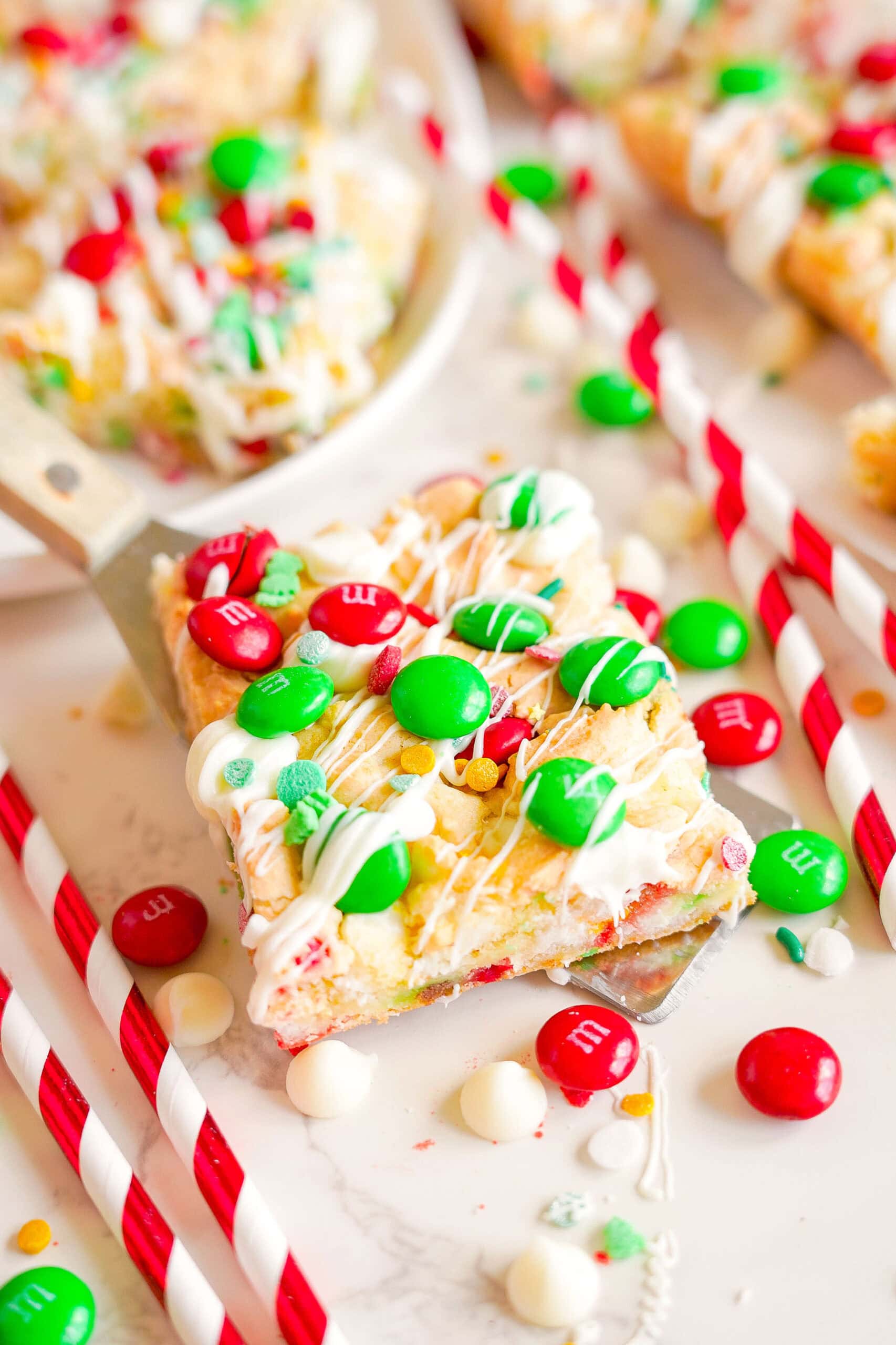 Holiday cookie bars on a spatula.