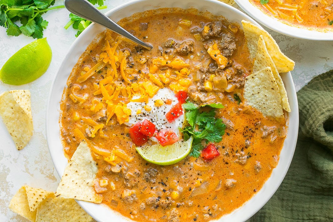 Cheesy soup with tortilla chips.