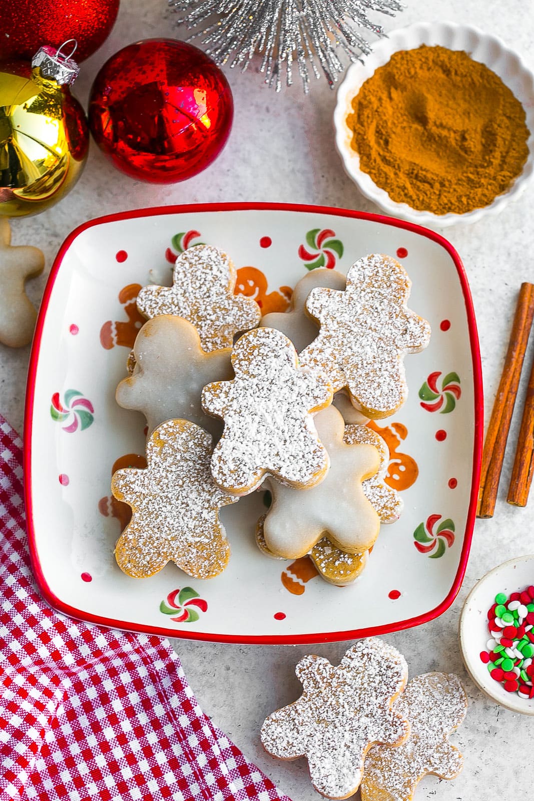 Mini Gingerbread Man Cookies on a Christmas plate.