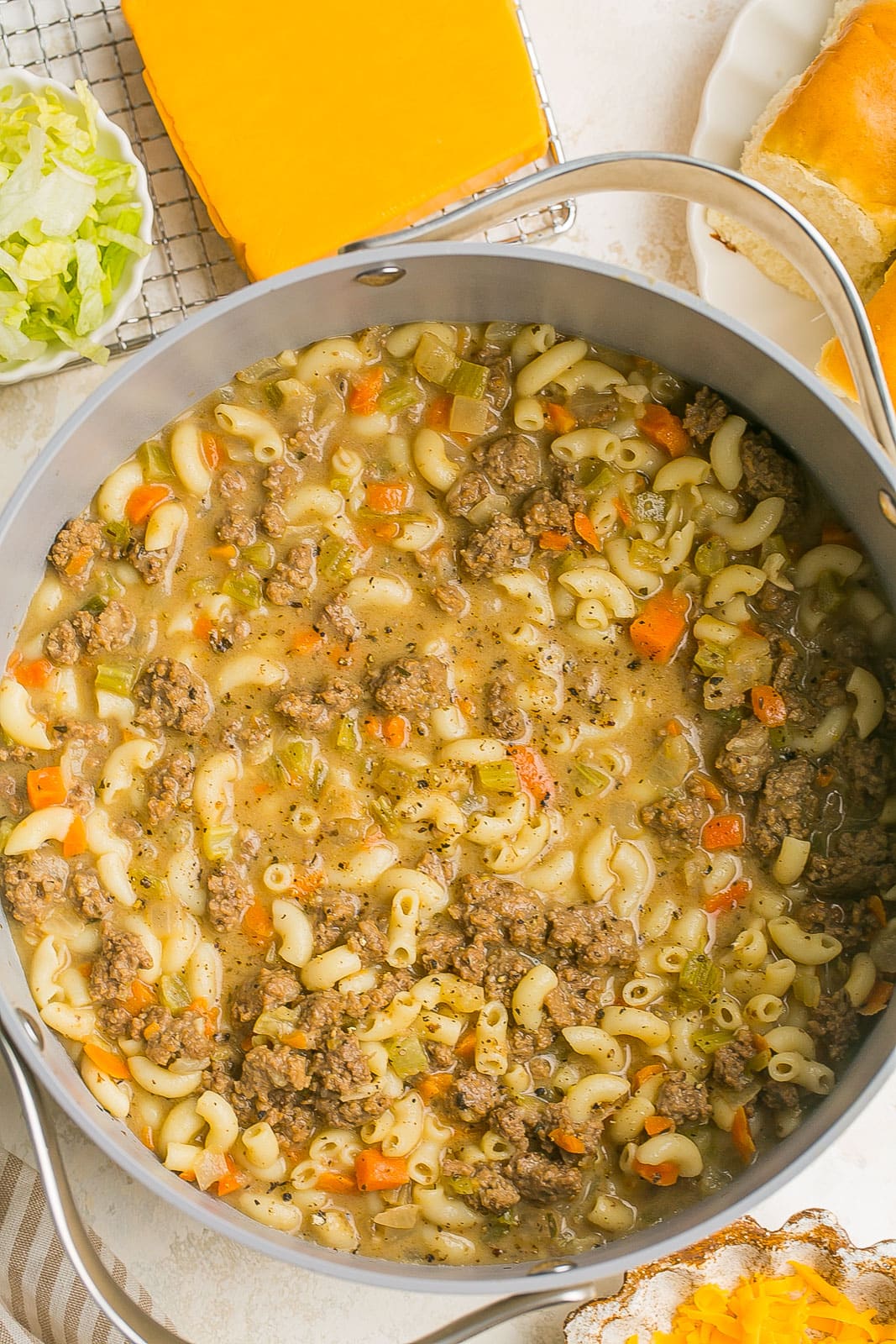 A pot full of macaroni cheeseburger soup.