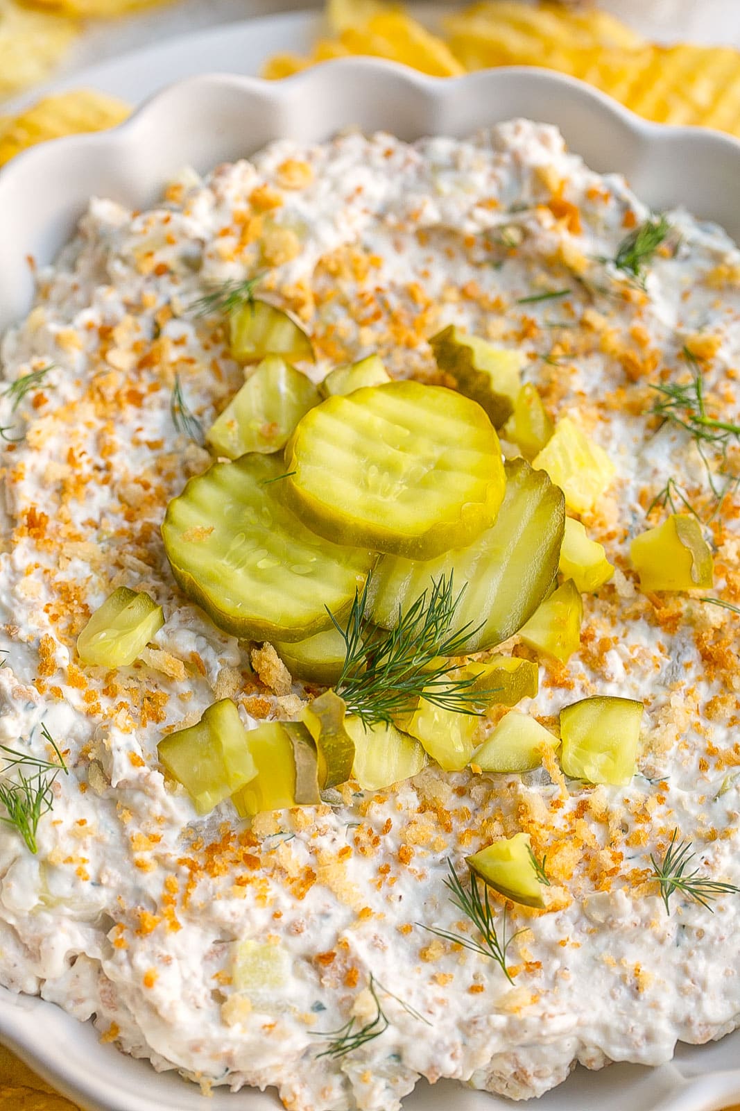 Pickles and buttery breadcrumbs on dil pickle dip.