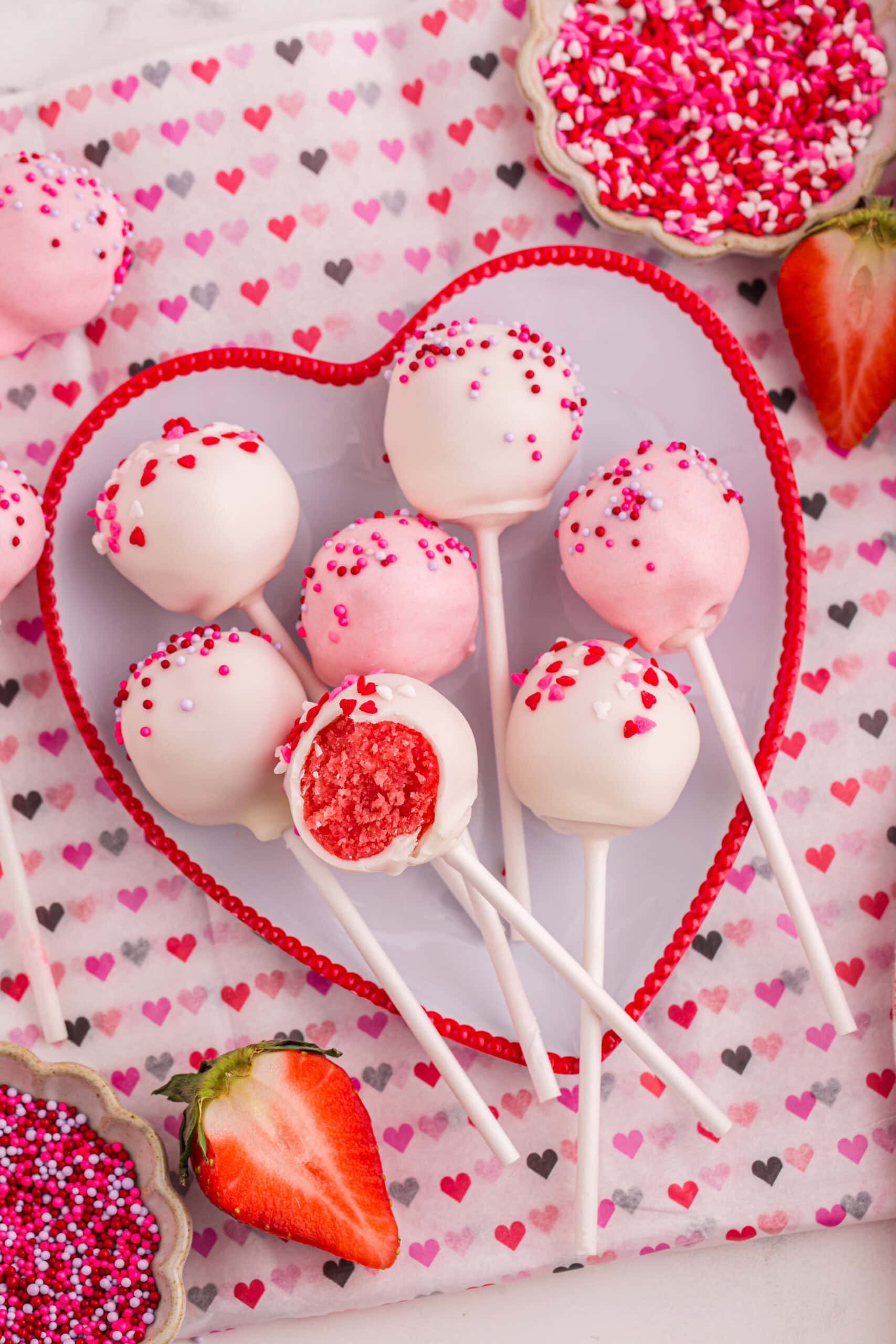 Strawberry Cake Pops on a plate.