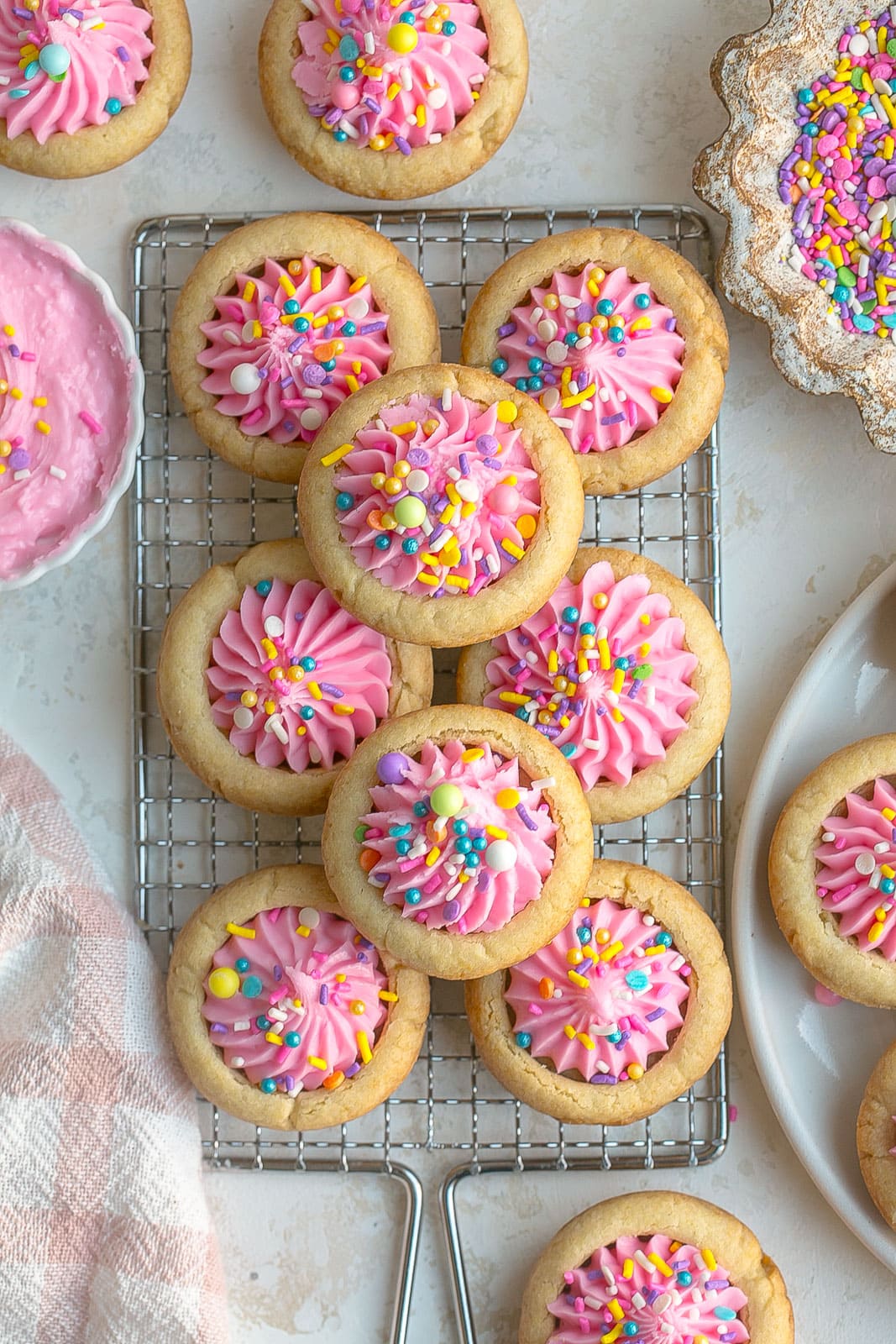 Valentine's Day Cookie Cups on a cooling rack. 