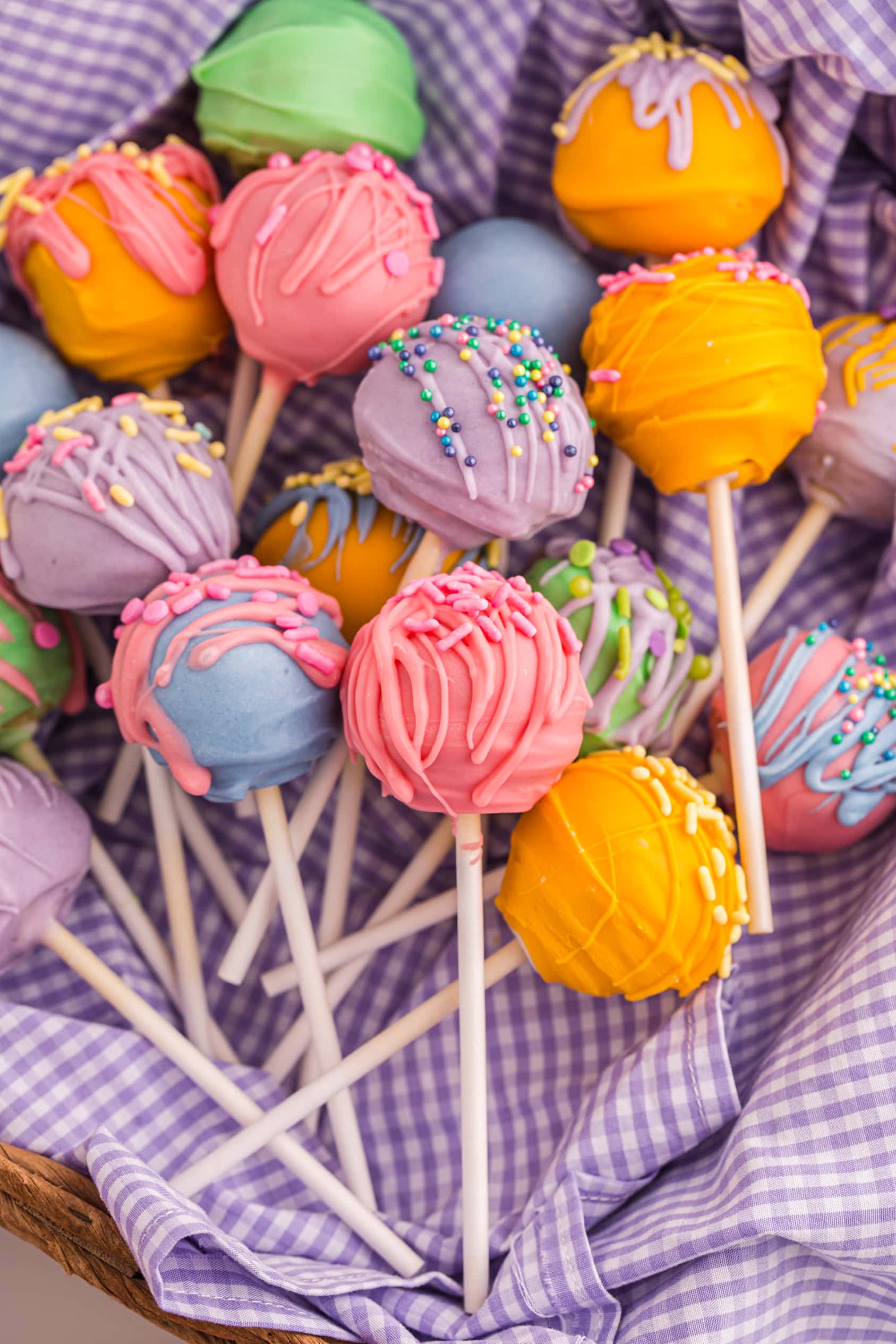 Easter Cake Pops in an Easter Basket.