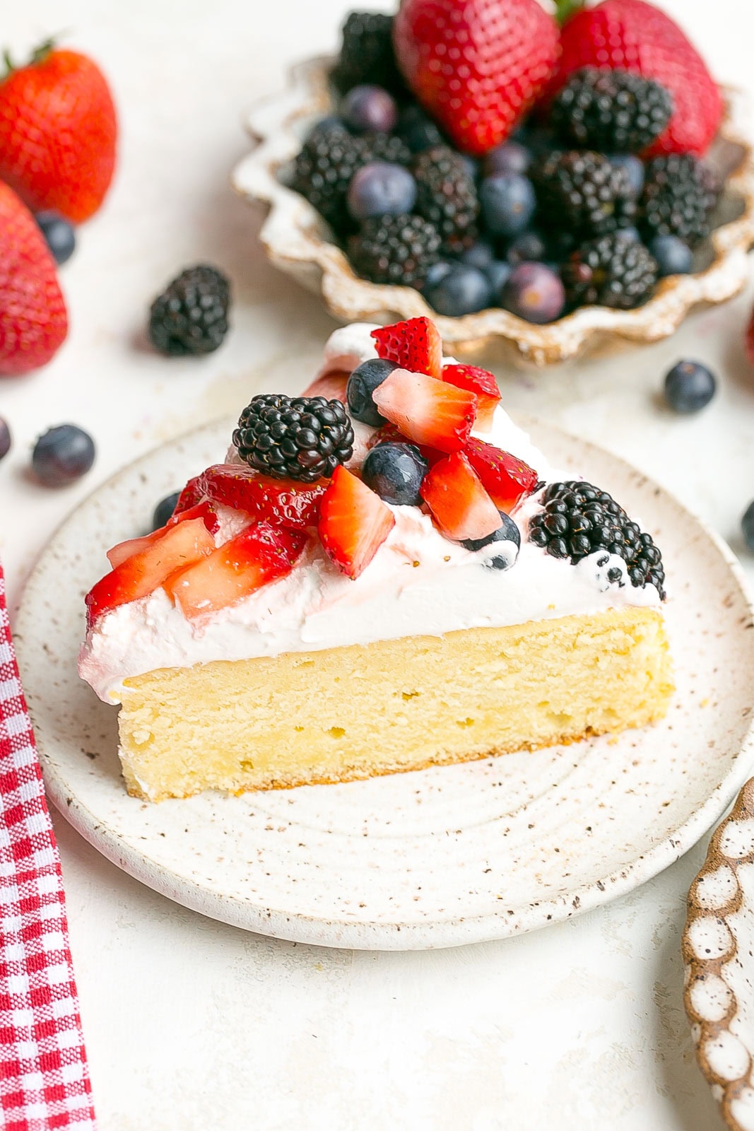 Side view of a slice of Berry Shortcake.