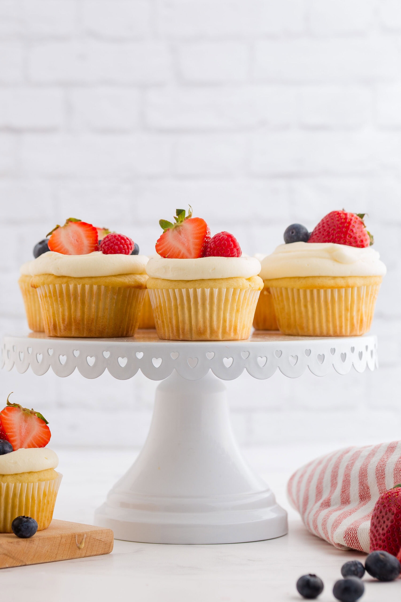 Berry Chantilly Cupcakes on cupcake stand.