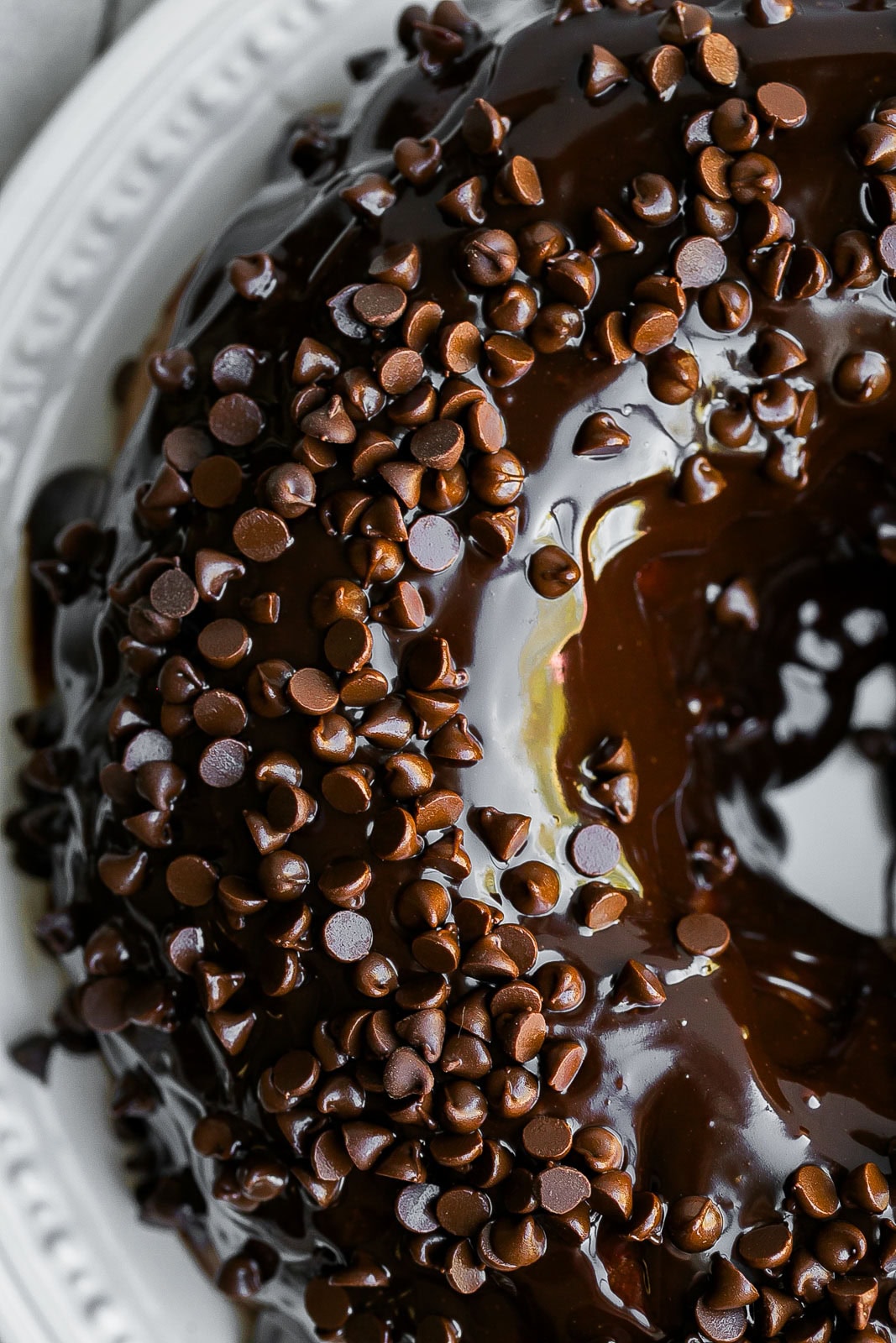 Close up view of a Glazed  Chocolate Bundt Cake.