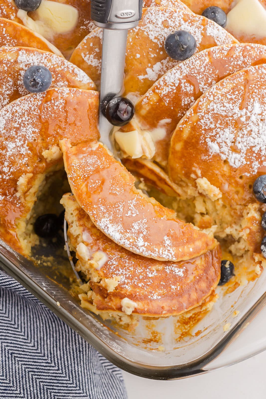Blueberry Pancake Casserol getting scoooped.