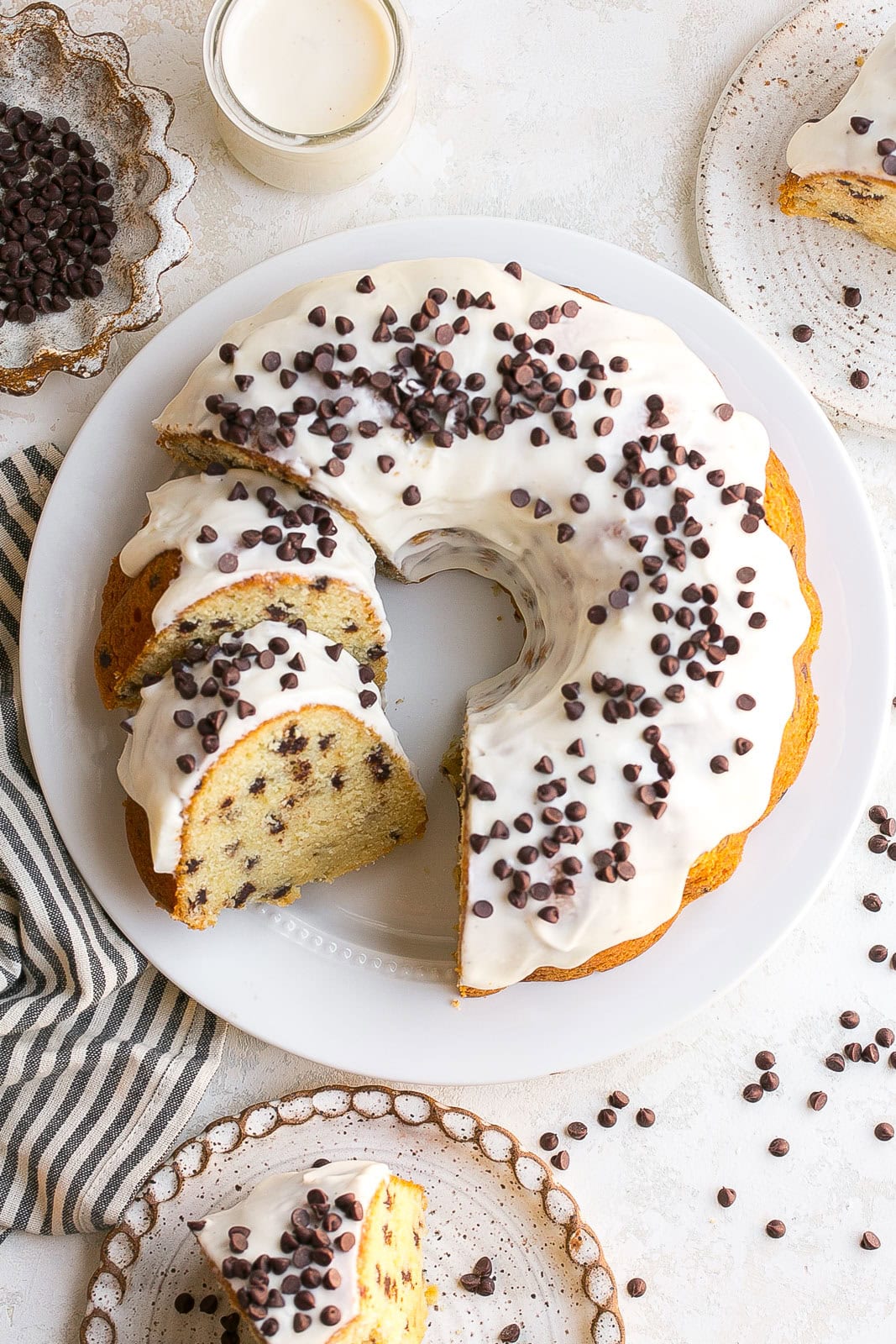 Overhead view of vanilla frosted Chocolate Chip Pound cake.