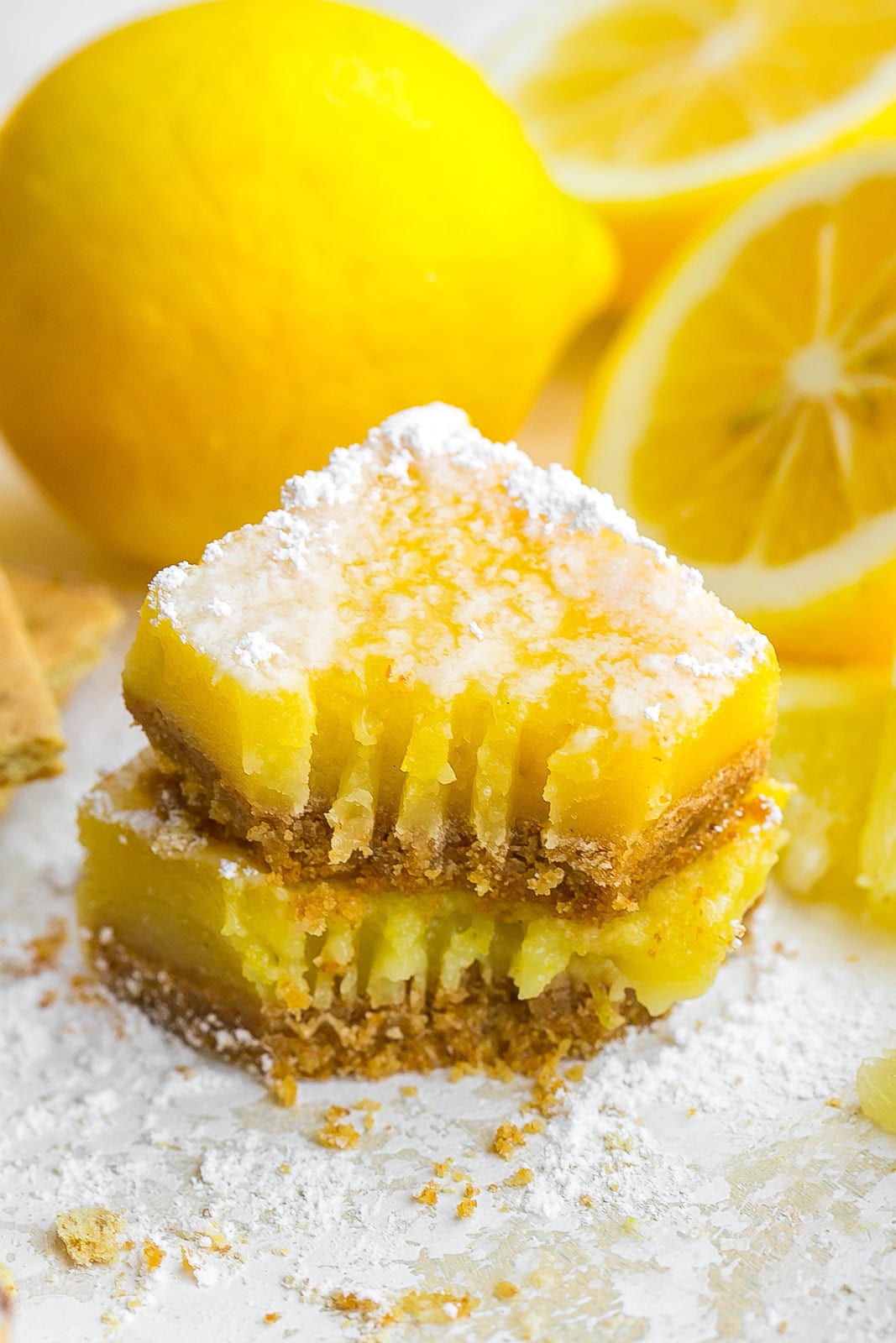 Stack of Lemon Bars with fork mark.
