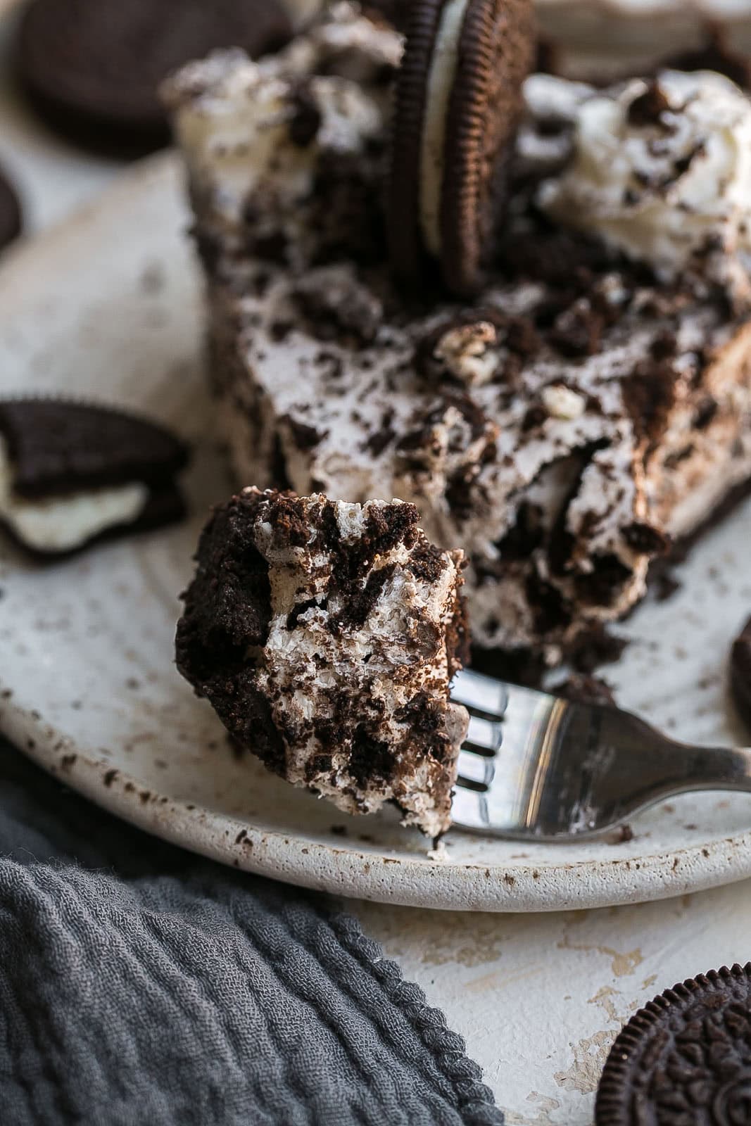 Fork with a bite of an Oreo Pie.